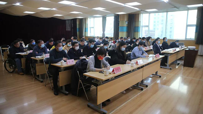 图为北京市残联召开党的十九届六中全会精神宣讲报告会现场